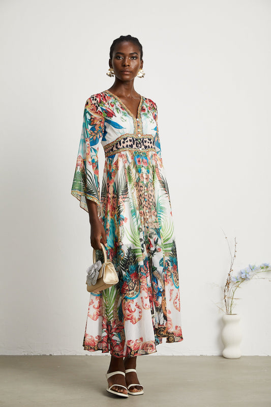 Éva pattern-print V-neck midi dress