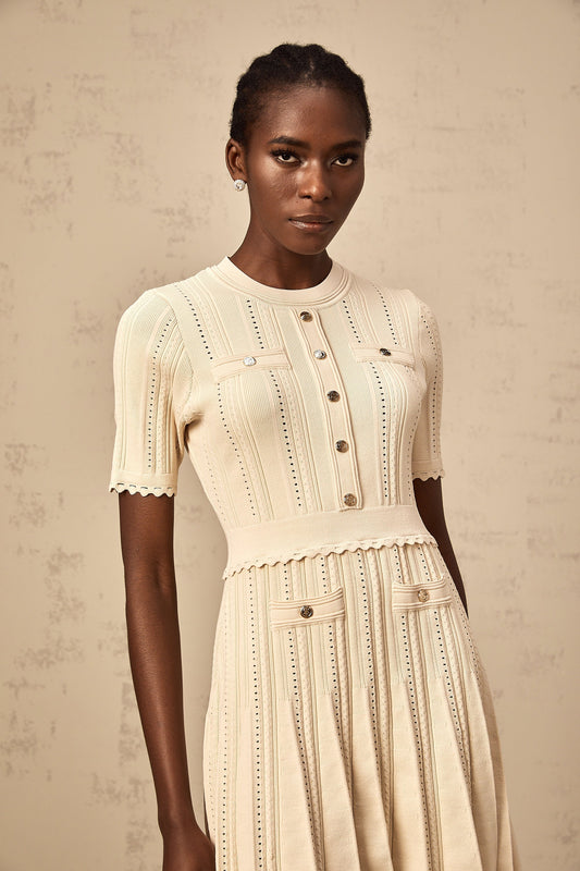 Amélie neutrals pointelle-trim pleated knit mini dress