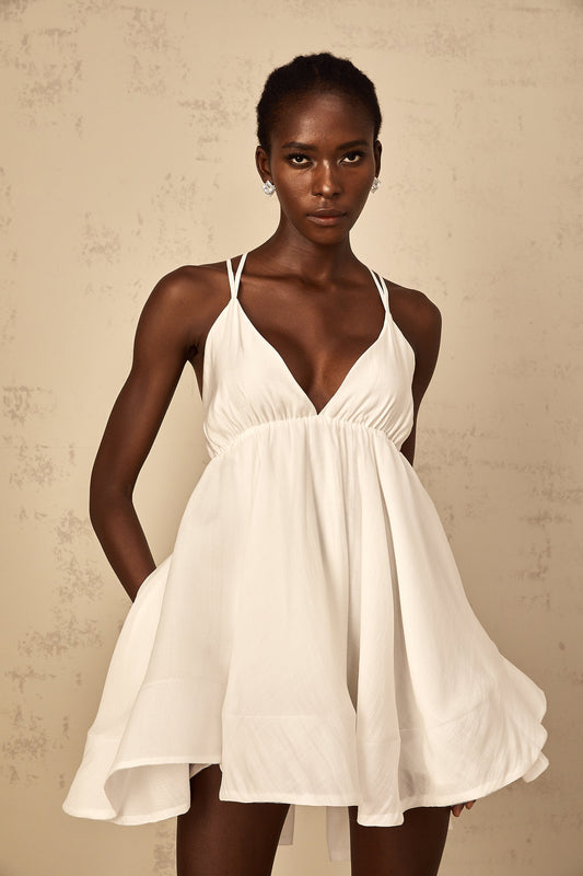 Quincie white shirred flounced mini dress